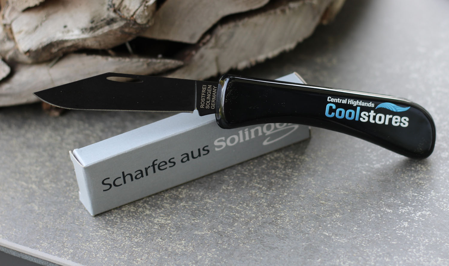 Taschenmesser mti Teflonklinge und Werbeaufdruck