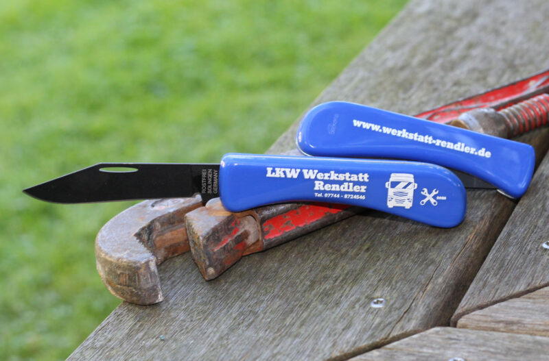 Taschenmesser mit beidseitigem Druck auf den Griffschalen